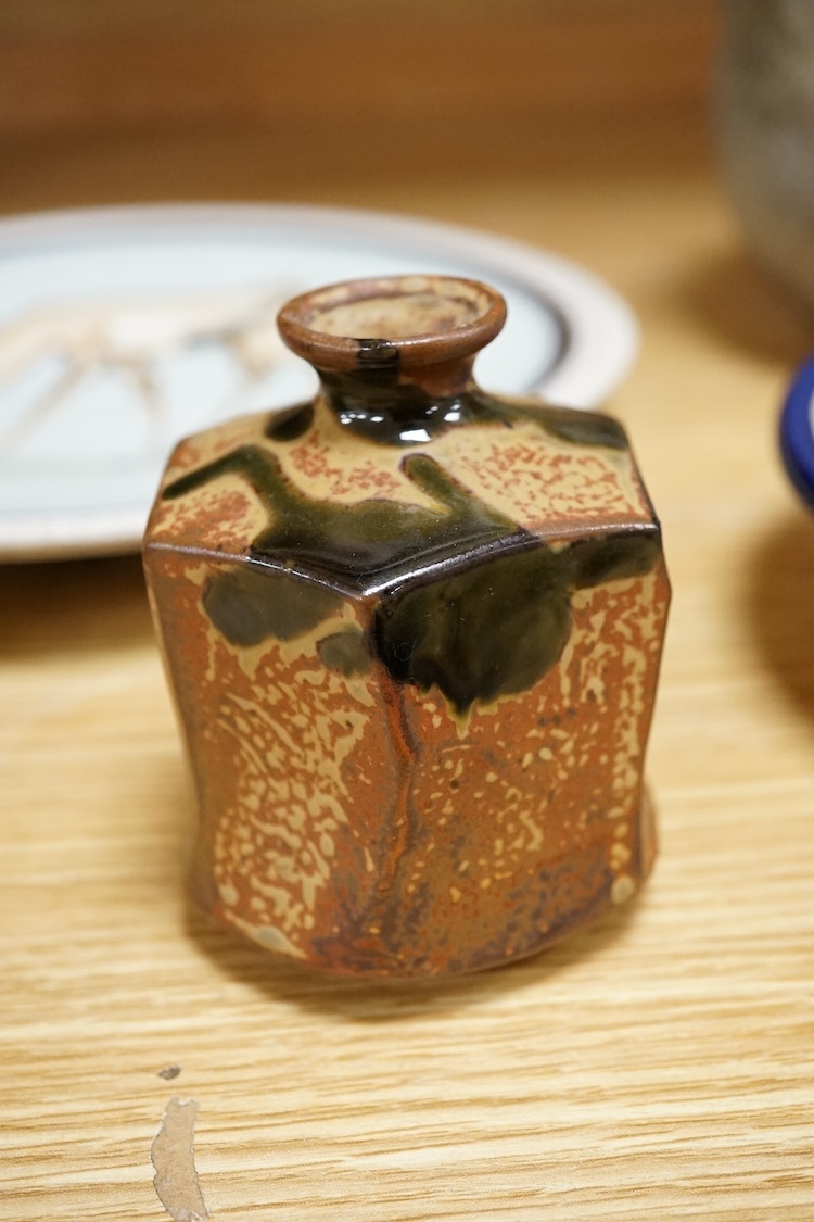 A group of five pieces of Studio pottery, some with impressed signatures to include a hexagonal jar and dishes, largest 25cm high